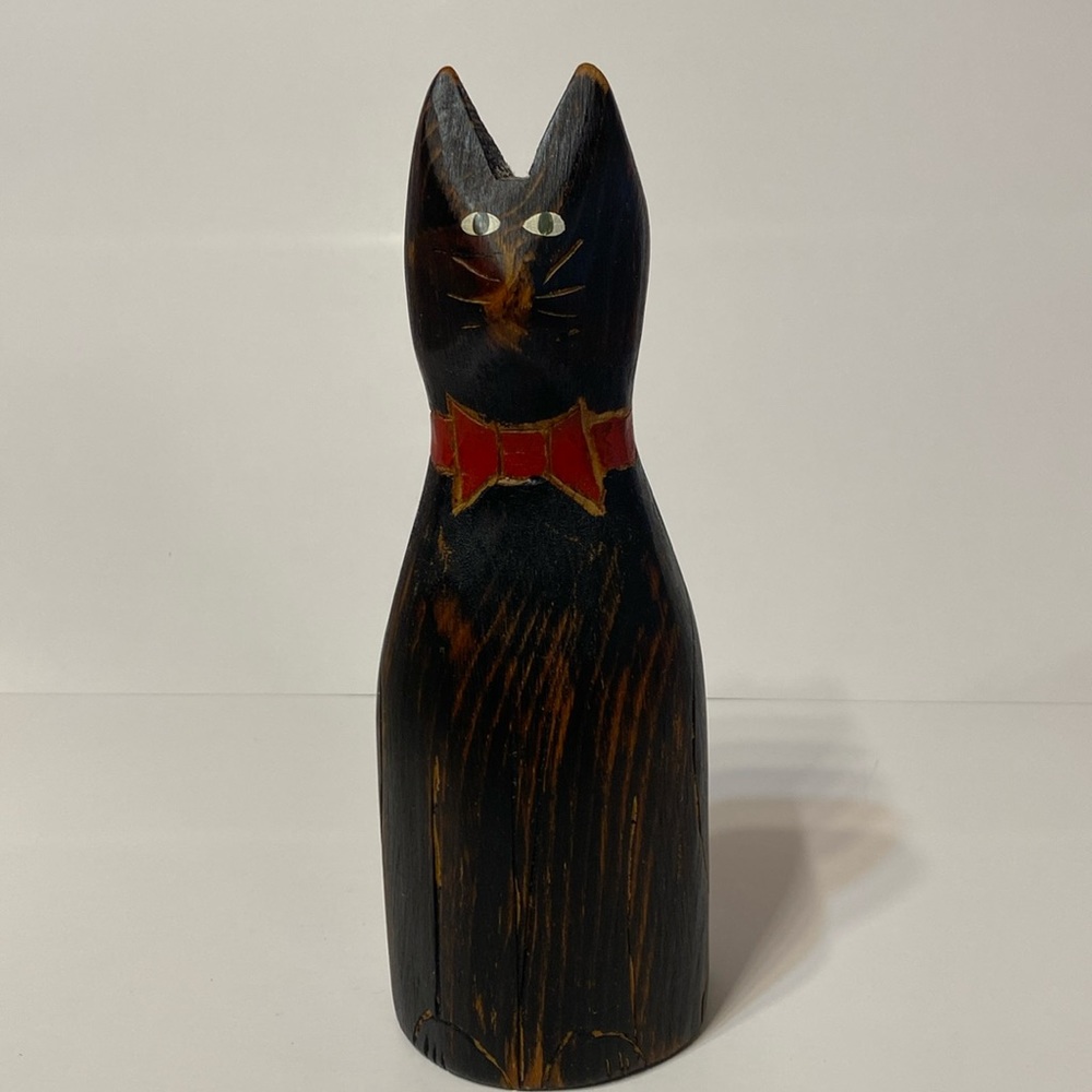 Wood carved cat sculpture by Karen Rankin.
